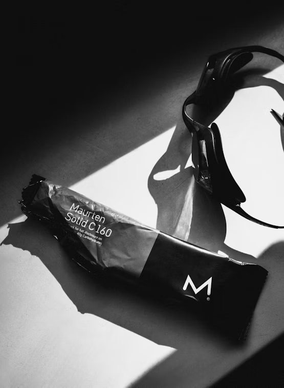 Maurten Solid 160 energy bar multipack with six boxes of mixed flavors, perfect for sports nutrition and active lifestyles.