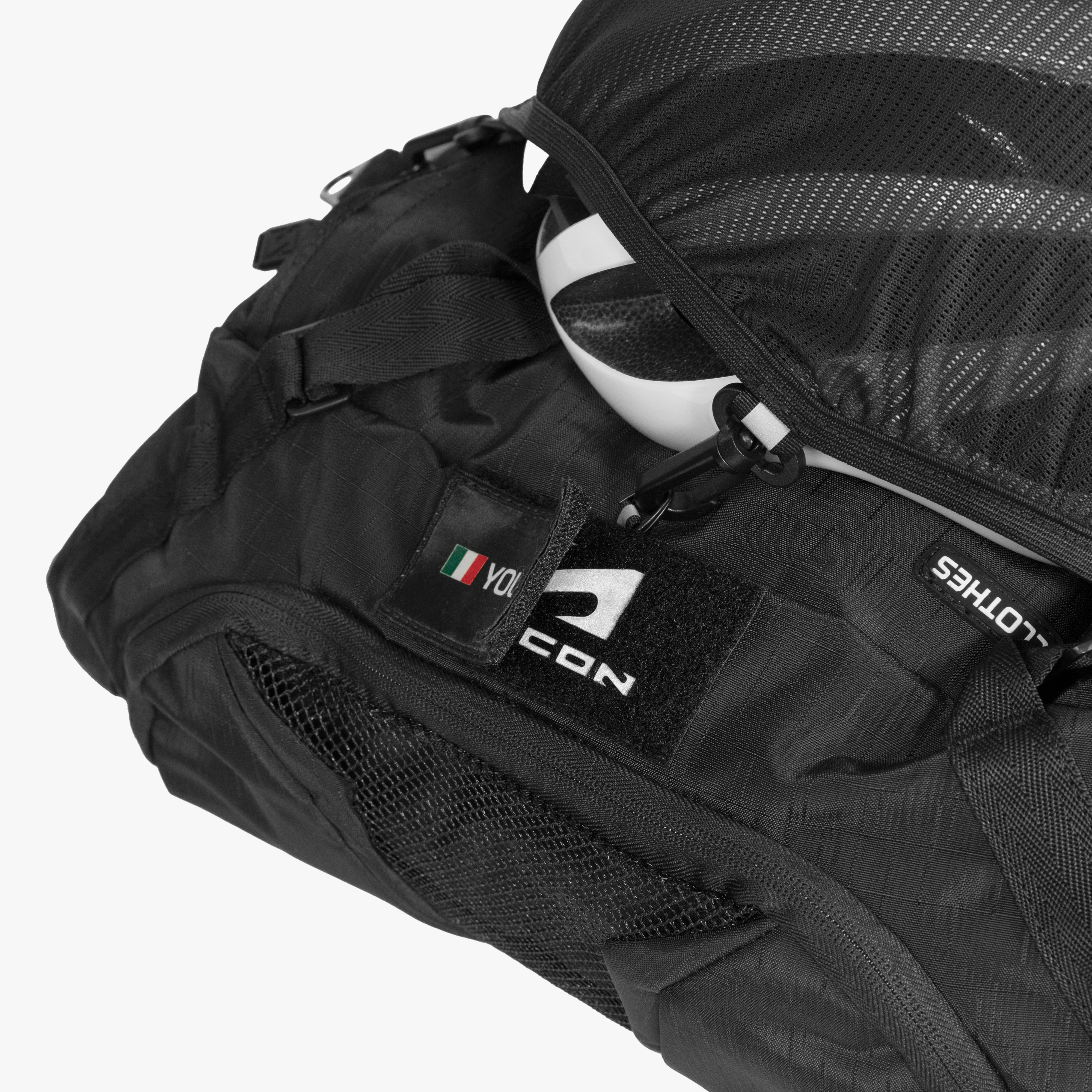 Black 25L Scicon duffel bag with zippered compartments and adjustable shoulder strap, designed for travel and sports use.