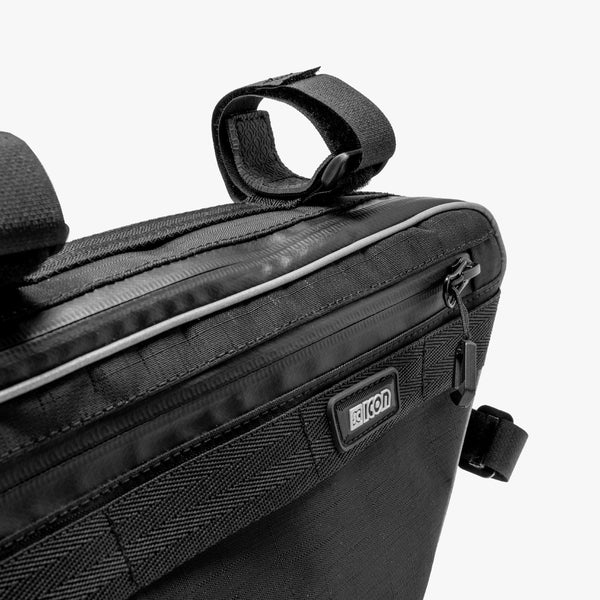 Scicon 3L bike frame bag attached to a bicycle frame, compact storage solution for cycling essentials