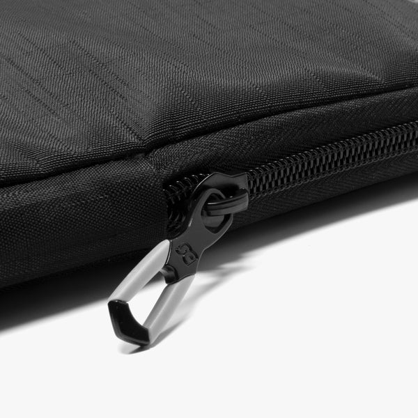 Scicon Classic 13-inch laptop sleeve case with padded exterior and zipper closure, designed for protection and portability.